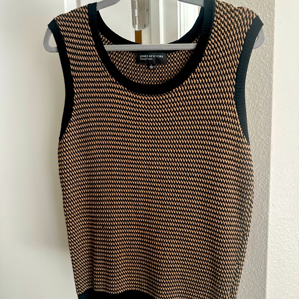 Classy/Vintage sweater vest. Sleek/thin - not overwhelming thick. Black and Tan.